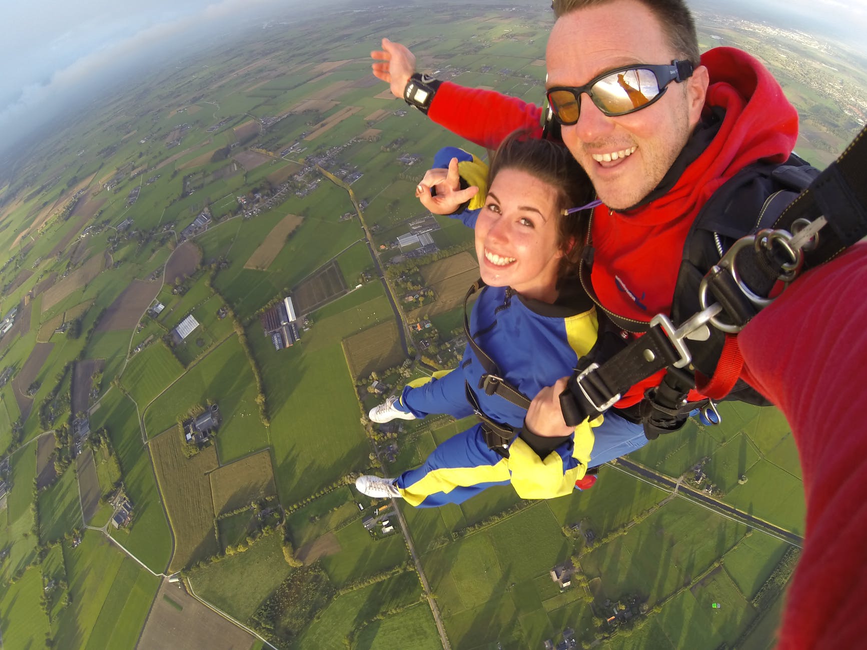 couple riding parachute together