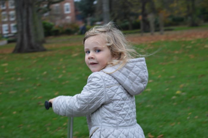 girl riding scooter