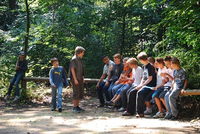 teenagers in forest 