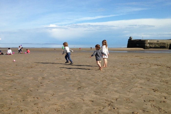children playing at sandersfoot beach