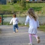 children running around lake bluestone