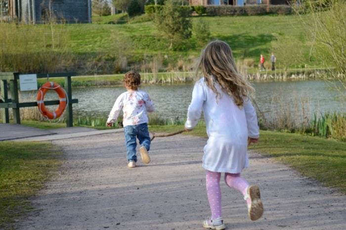 children running around lake bluestone
