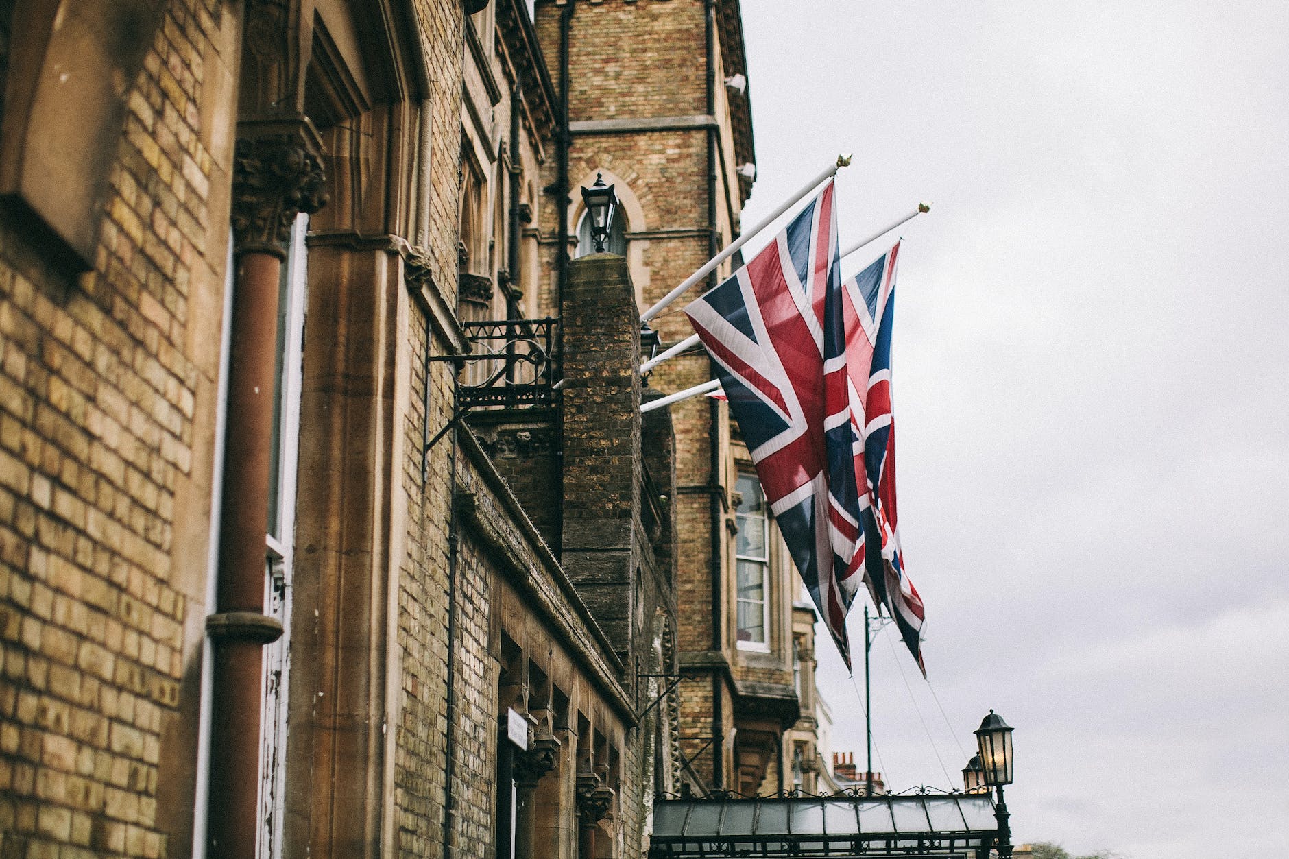 hanged flags beside building