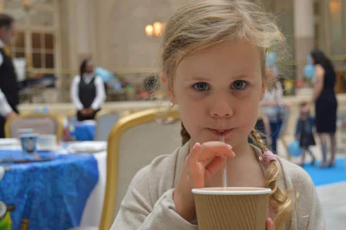 Girl drinking through straw