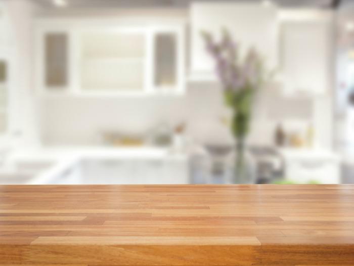 Empty wooden table and blurred kitchen background, product display