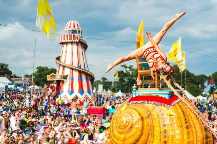 Helter skelter and fairground acts at Camp Bestival