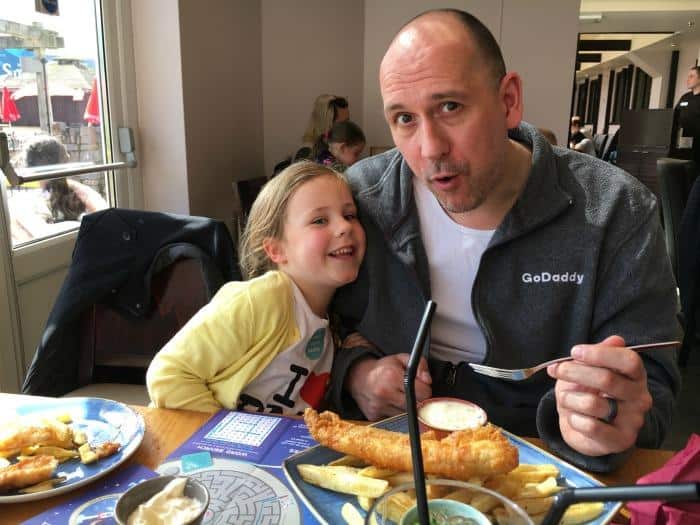 dad and daughter having meal together