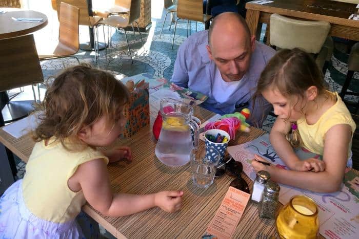 Family choosing what to eat at Las Iguanas 