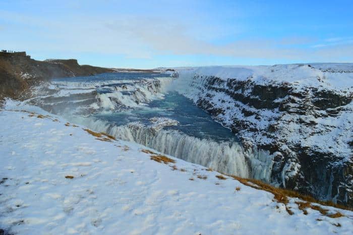Gullfoss waterfall in snow - The best Game of Thrones Iceland DIY Itinerary for planning your trip. If you want to visit the Game of Thrones locations in Iceland without paying for a tour this travel guide takes you to all the famous spots as well as some can't miss places to visit in Iceland too #Iceland #GameofThrones #traveltips #travelhacks 