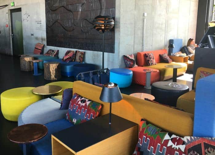 colourful seats and cushions at the monkey bar at 25 hour bikini hotel berlin 