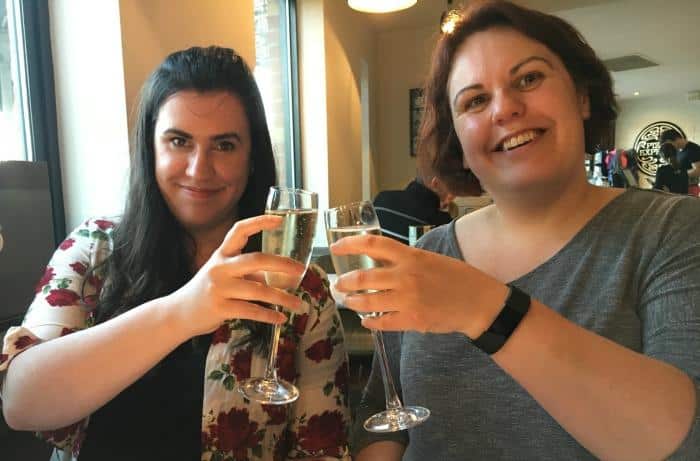 two ladies drinking prosseco at restaurant