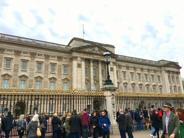 Buckingham Palace including gates and visiting tourists