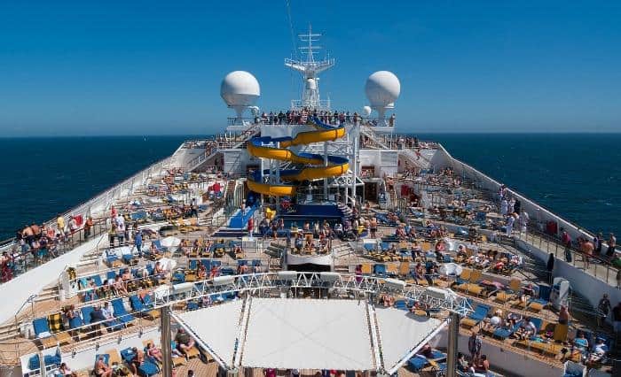 top deck cruise ship with water slides and swimming pool