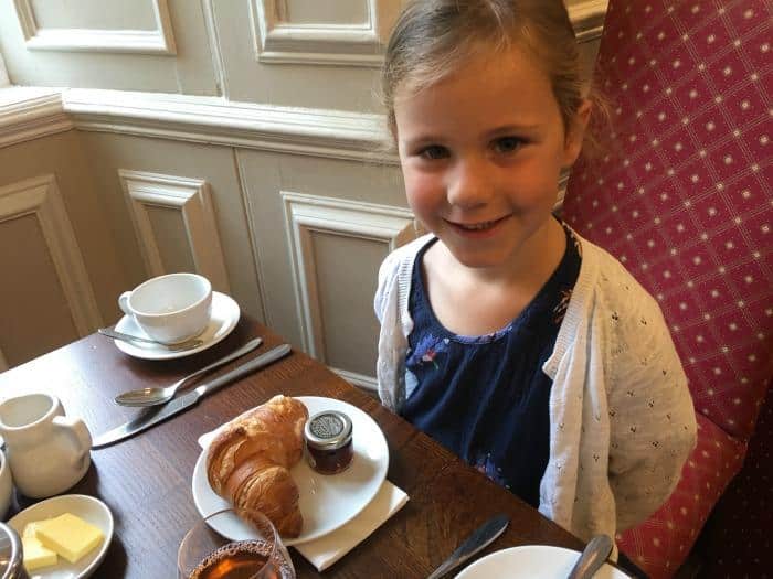 child having breakfast