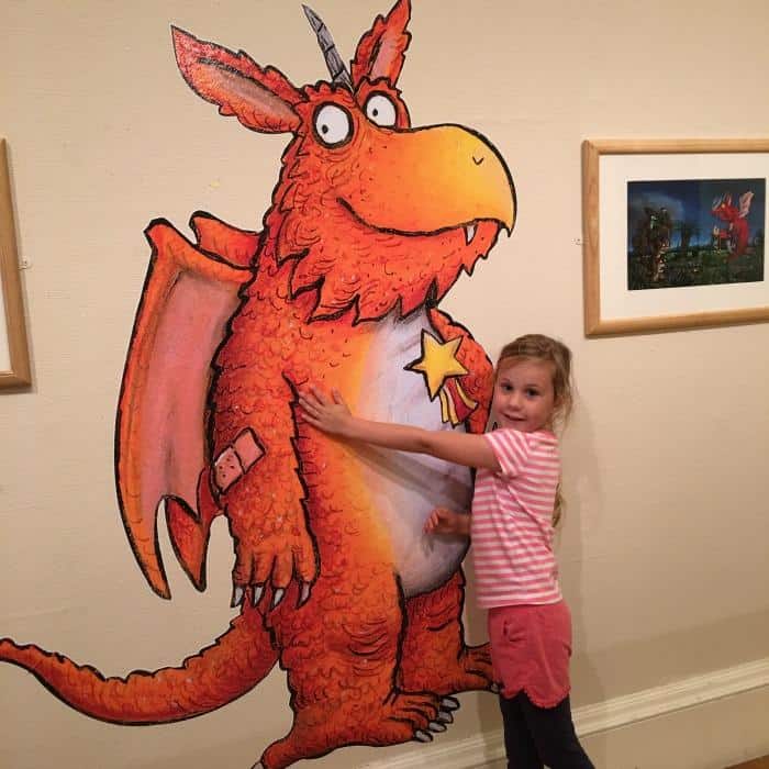 child with picture of dragon at victoria art gallery in Bath England