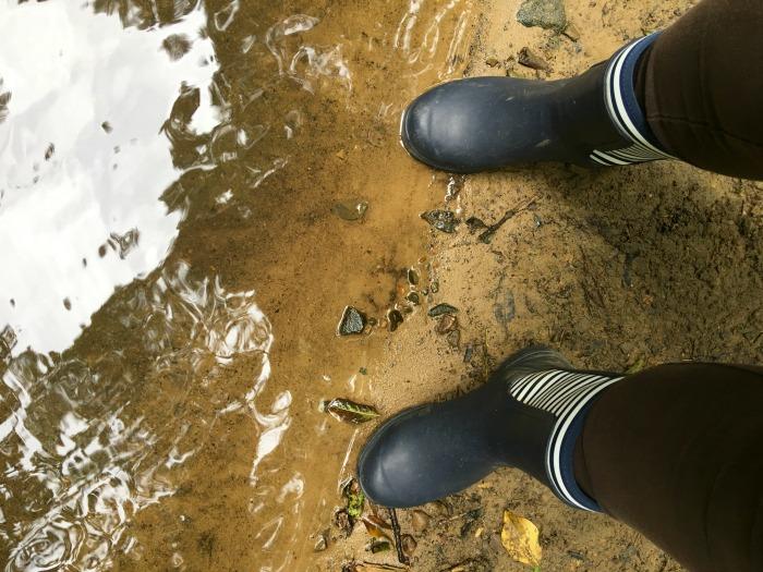 wellington boots near water