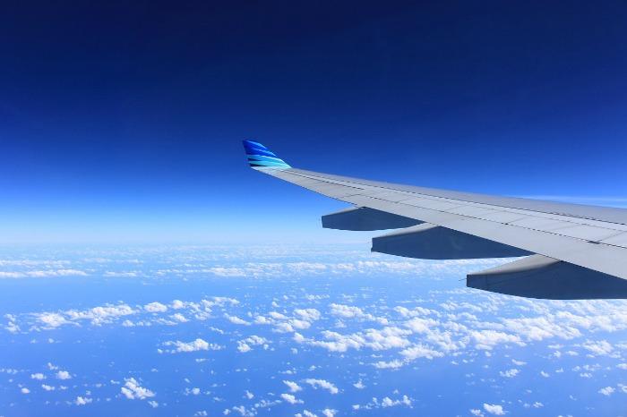 airplane wing blue sky