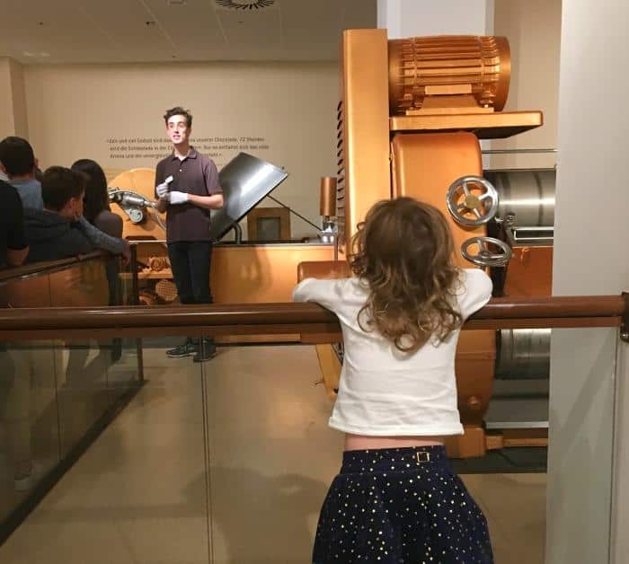 child watching tour guide at Chocoversum in Hamburg 