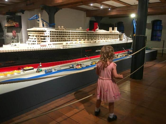 kid looking at Lego Ship at Maritime Museum Hamburg