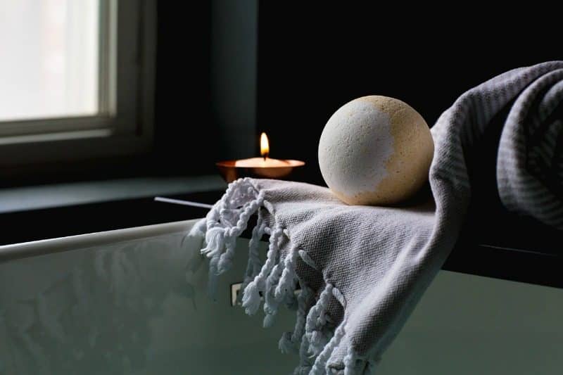 bath candle and towel bath bomb 