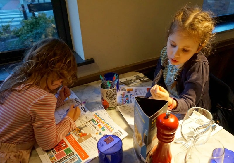 children doing activities at pizza express