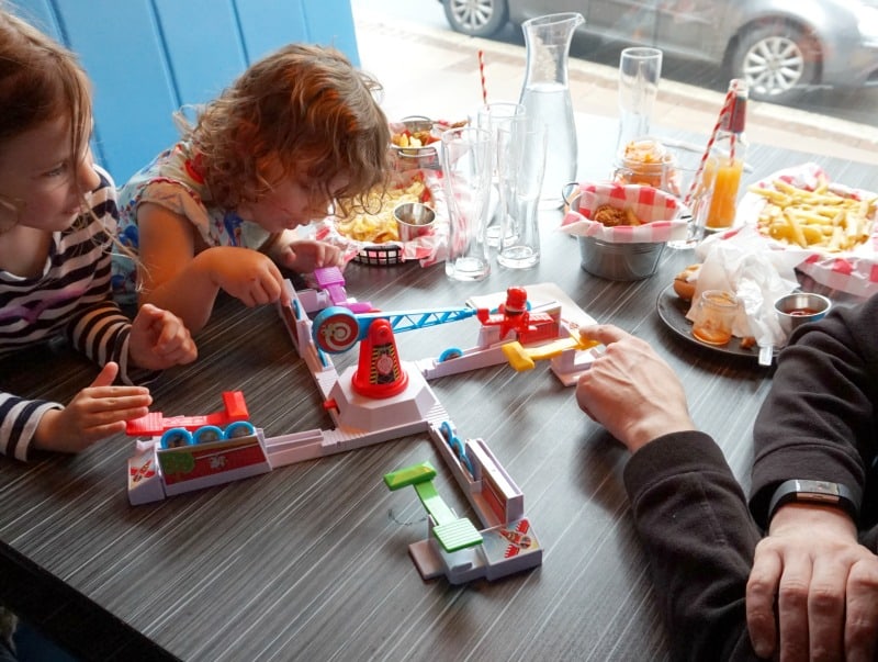 family at board cafe exeter