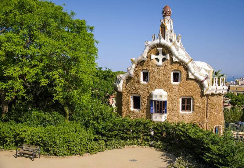 building and trees in guell-park in barcelona
