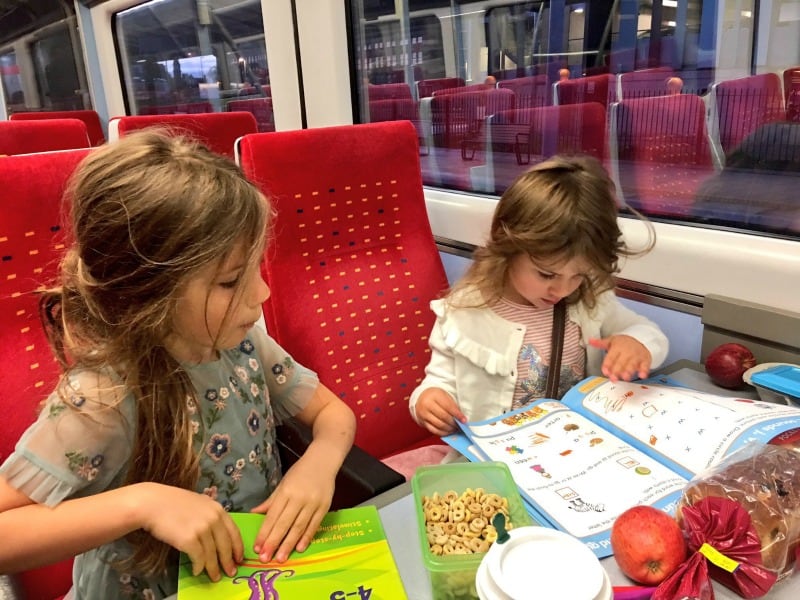 kids travelling on a train