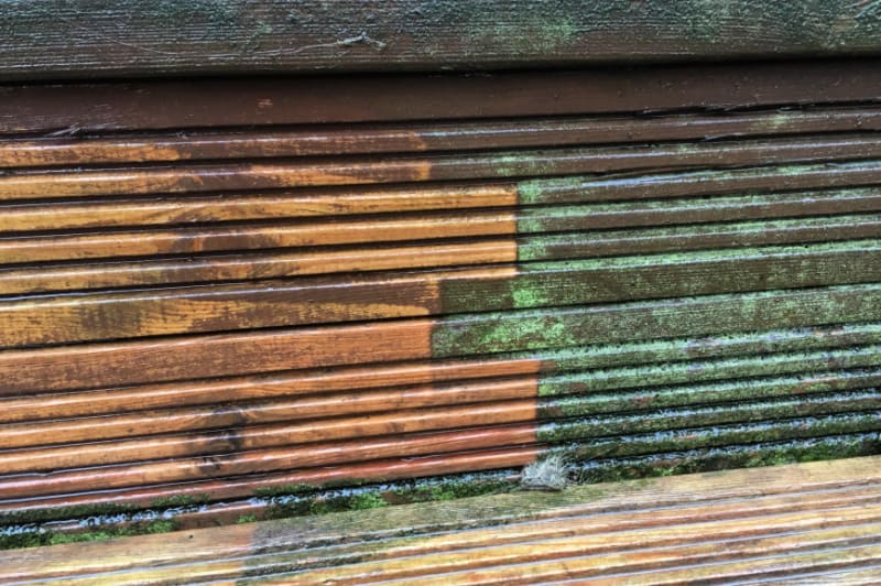 before and after cleaning decking with pressure washer