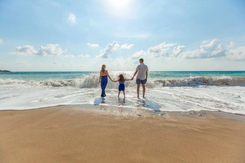 family on luxury beach holiday