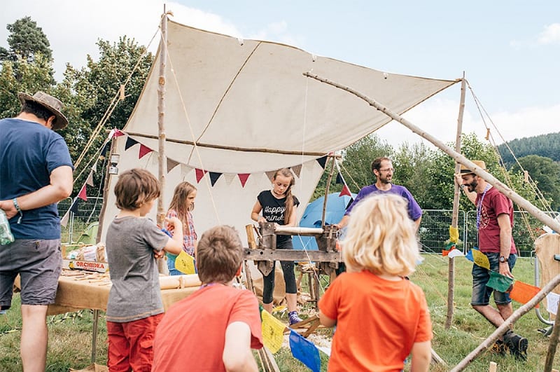 children taking part in activity in tent at green man festival 