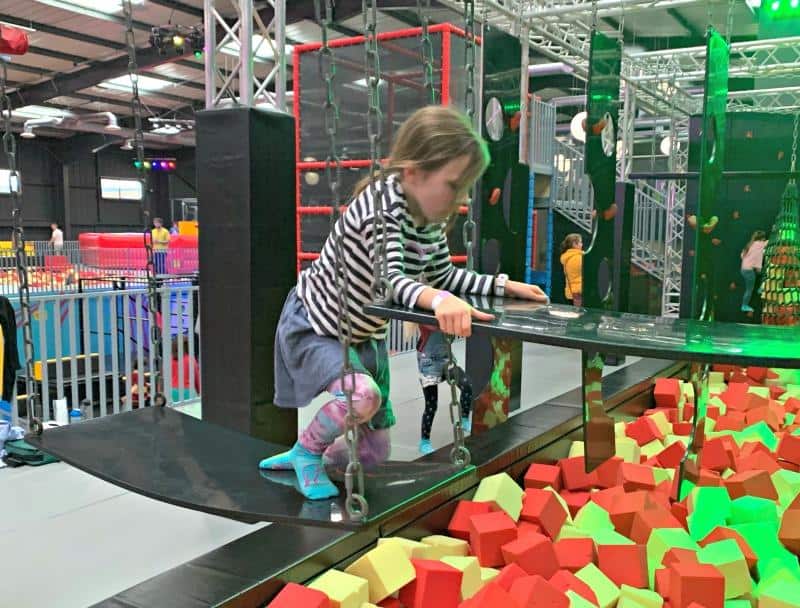 child on Ninja warrior assault course at Red Kangaroo 