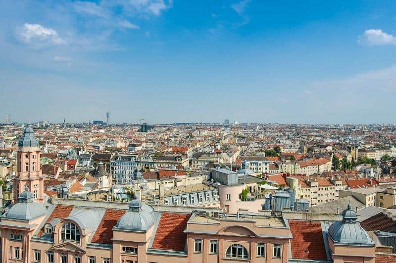 panoramic view over rooftops of Vienna, Austria on a blue sky day 