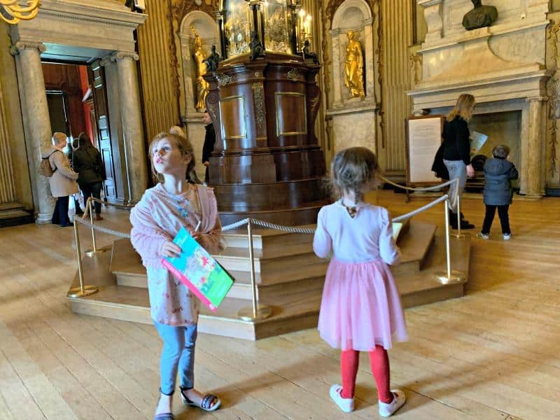 children looking around in Kings State Rooms at Kensington Palace