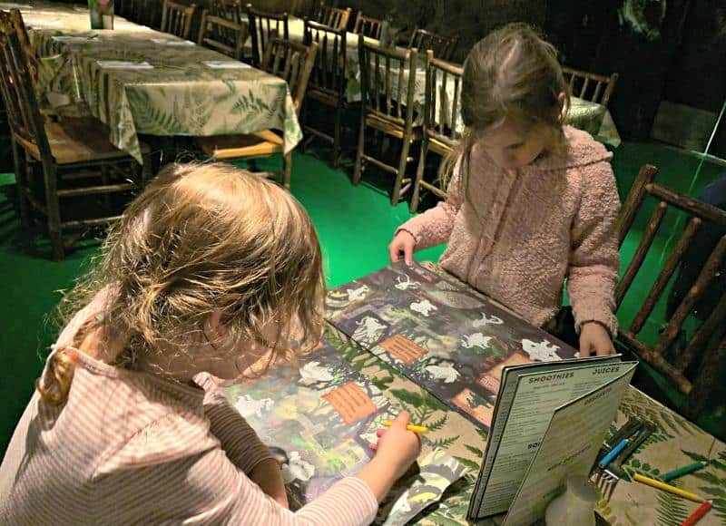 children sitting at table in rainforest cafe london