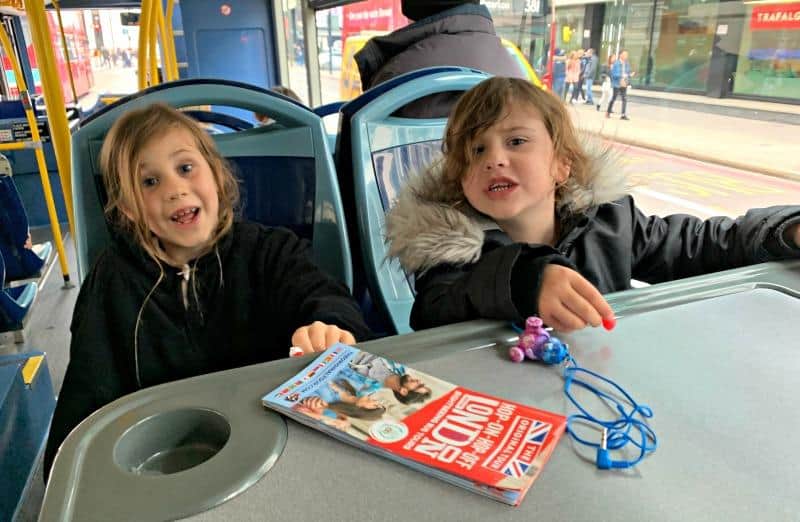 happy children on london bus tour