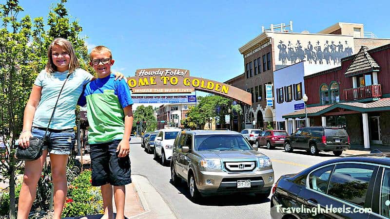 welcome to Golden Colorado sign with kids in front 