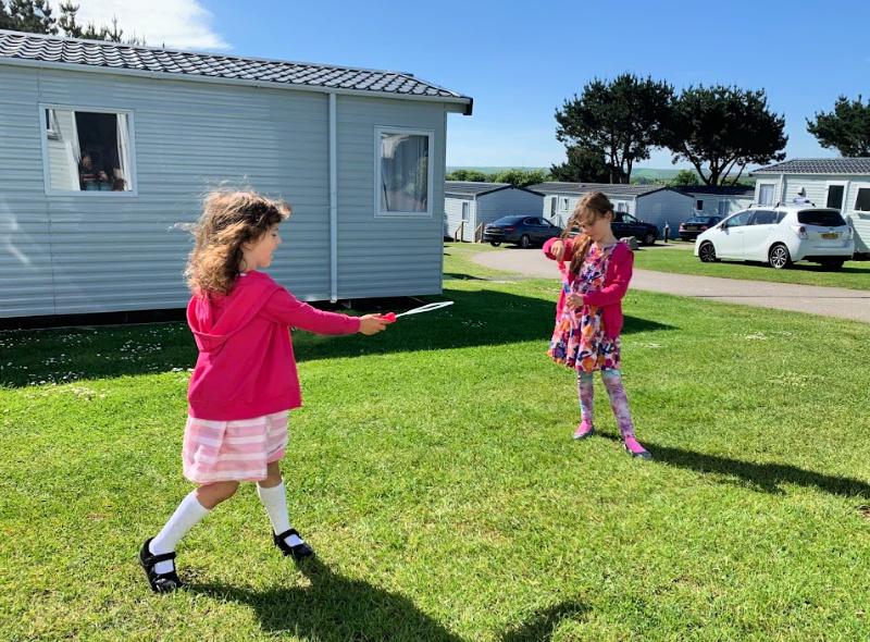 children playing bubbles outside at newquay caravan park