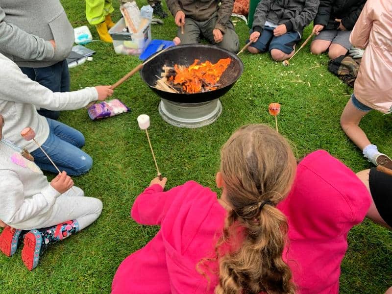 toasting marshmallows with newquay forest school at hendra