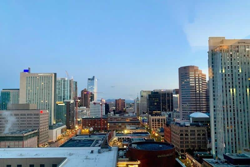 view of downtown denver and rocky mountains from sheraton hotel