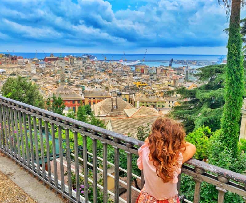 child looking at view over genoa from Belvedere Montaldo