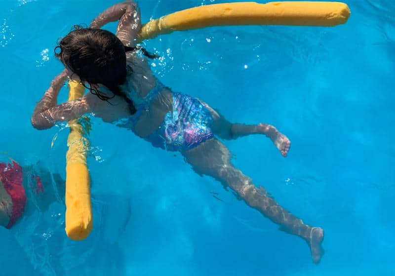 girl swimming in pool