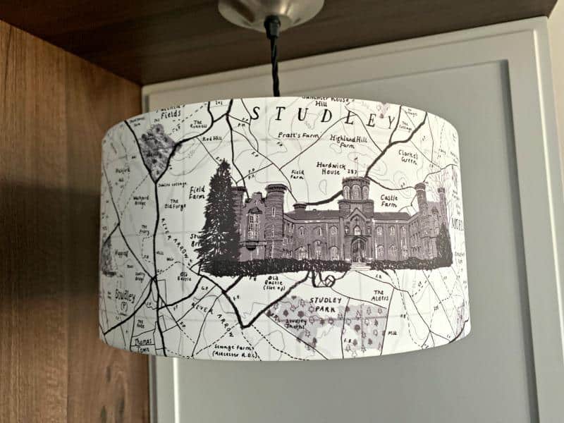lampshade decorated with map of studley castle 