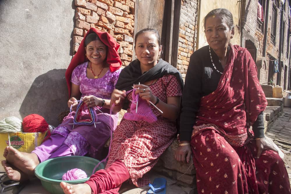 KATHMANDU, NEPAL, NOVEMBER 06, 2006: Unidentified women working in the street of Kathmandu, Nepal.