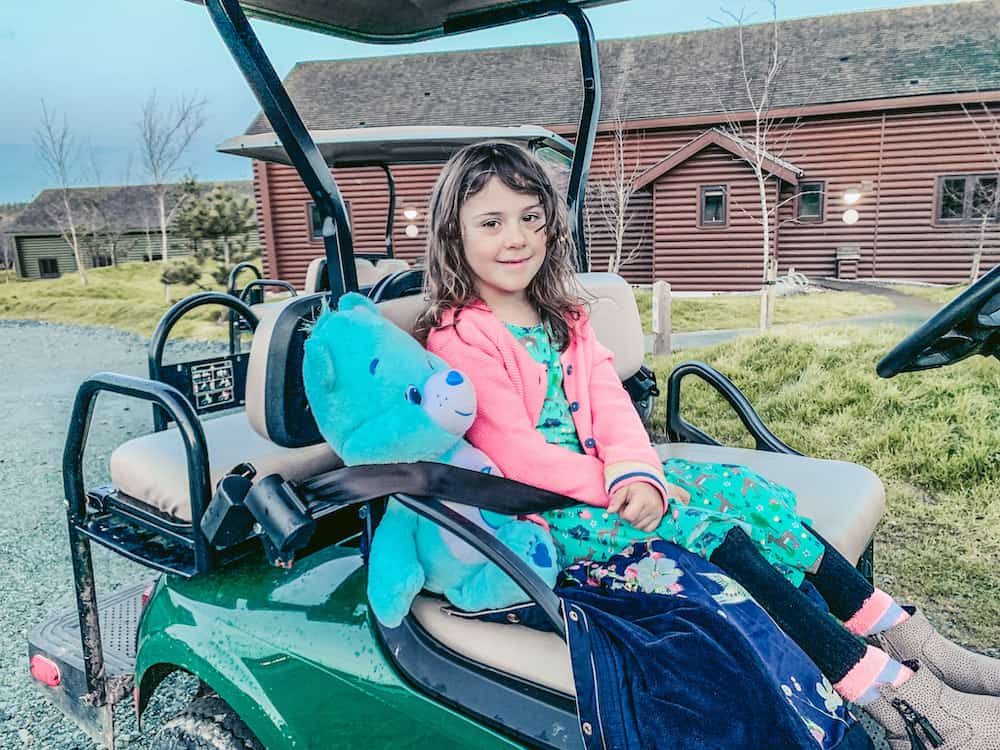 child sitting in buggy at bluestone