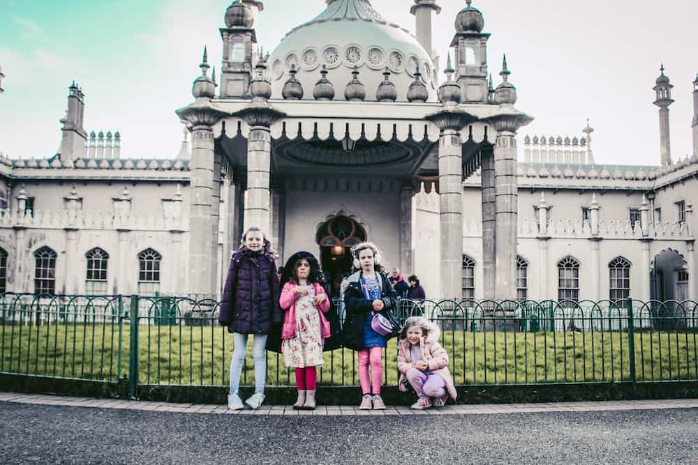 outside brighton pavilion with kids
