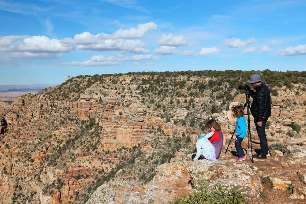 GRAND CANYON, USA - APRIL 3, 2014: People visit Grand Canyon National Park in Arizona. 4.56 million tourists visited Grand Canyon in 2013.