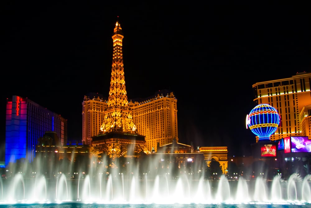 LAS VEGAS - MAY 2: The Musical fountains on Eiffel Tower of Hotel Paris background on May 2, 2007 in Las Vegas. Paris opening date was 09/01/1999. Paris cost $785 mln. to build, and occupies 24 acres