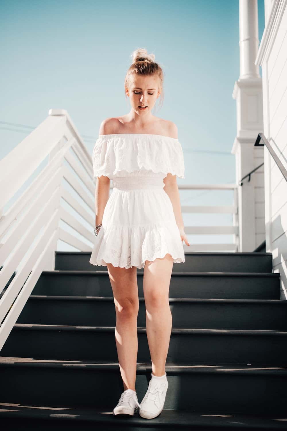 girl wearing white mini dress 
