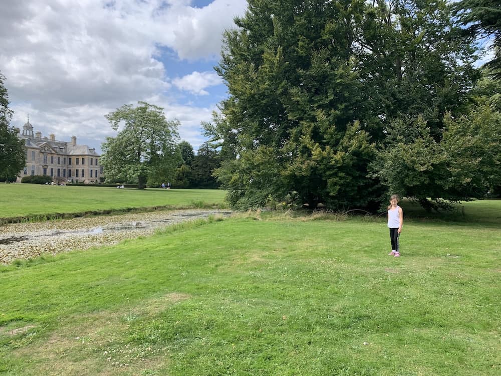 child in gardens at belton house 